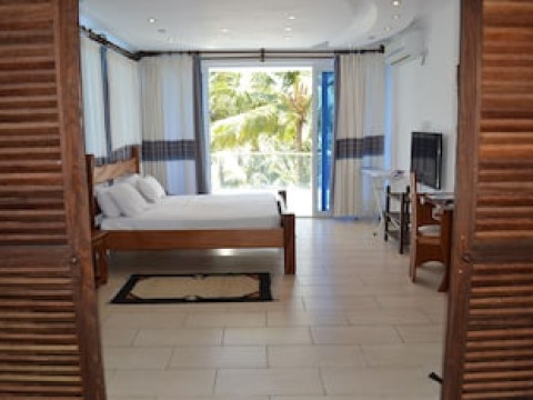 COWRIE SHELL BEACH APARTMENTS
