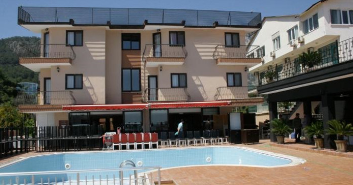 aleria-belport-beach-hotel-561618e0313c9497.jpeg