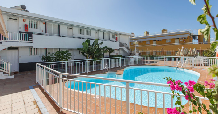 apartamentos-las-perlas-a6e7c3b13c1a5a20.jpeg